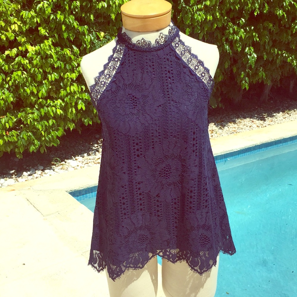 Brand new sexy and elegant top in navy lace.